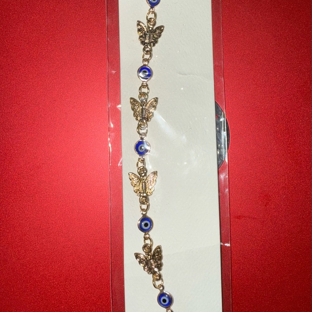 Gold Tone and Blue Butterfly Evil Eye Charm Bracelet
